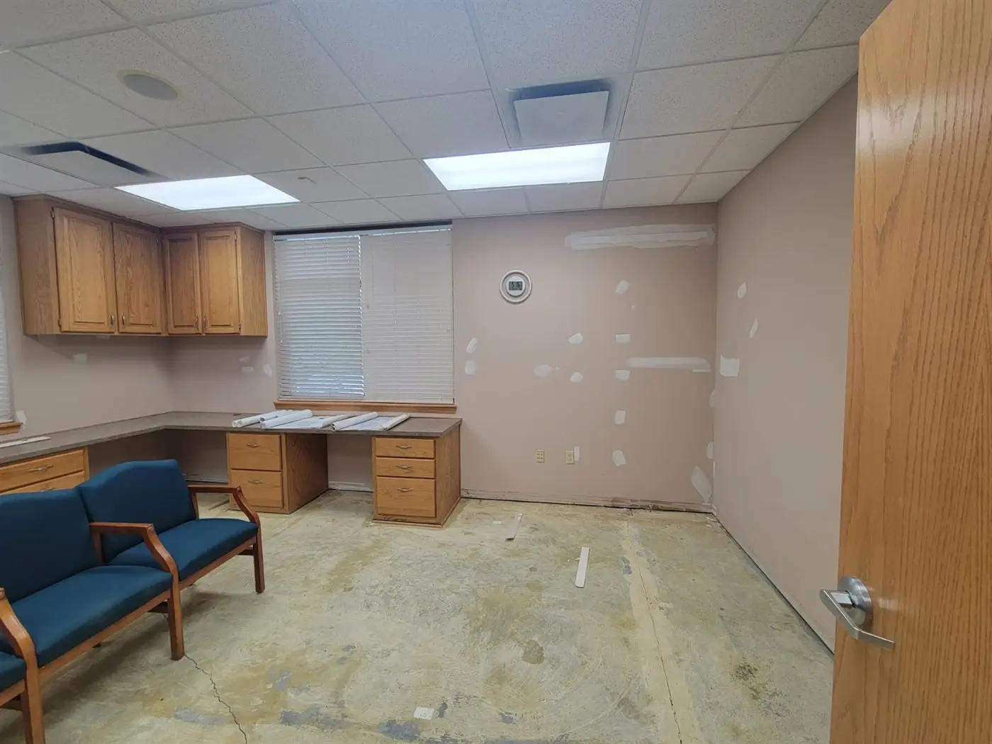 Office suite with new cabinetry and ceiling tiles